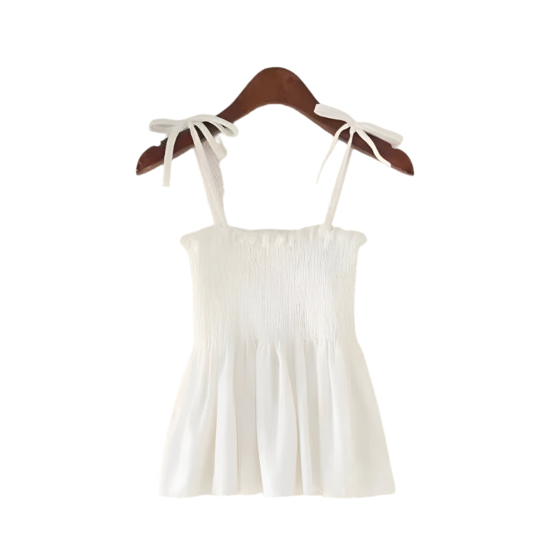 Kvinners mote halterneck topp. Plisseringer foran og elegant ryggfri detalj. Egnet for både hverdag og fest.