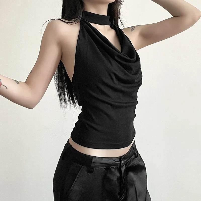 Stilig halterneck topp til dame, ideell for casual antrekk og som basisplagg. Ensfarget og moderne mote.
