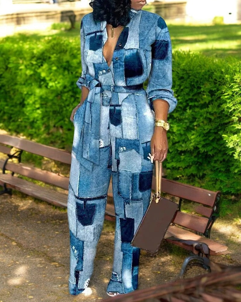 Trendy kvinner jumpsuit med livlig print, V-hals og høy midje. Et elegant og allsidig moteplagg for damer.