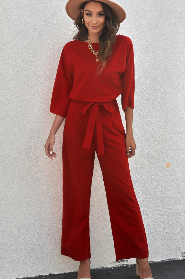 Tidløs damejumpsuit med brede ben og midjebelte for en sofistikert og komfortabel stil.