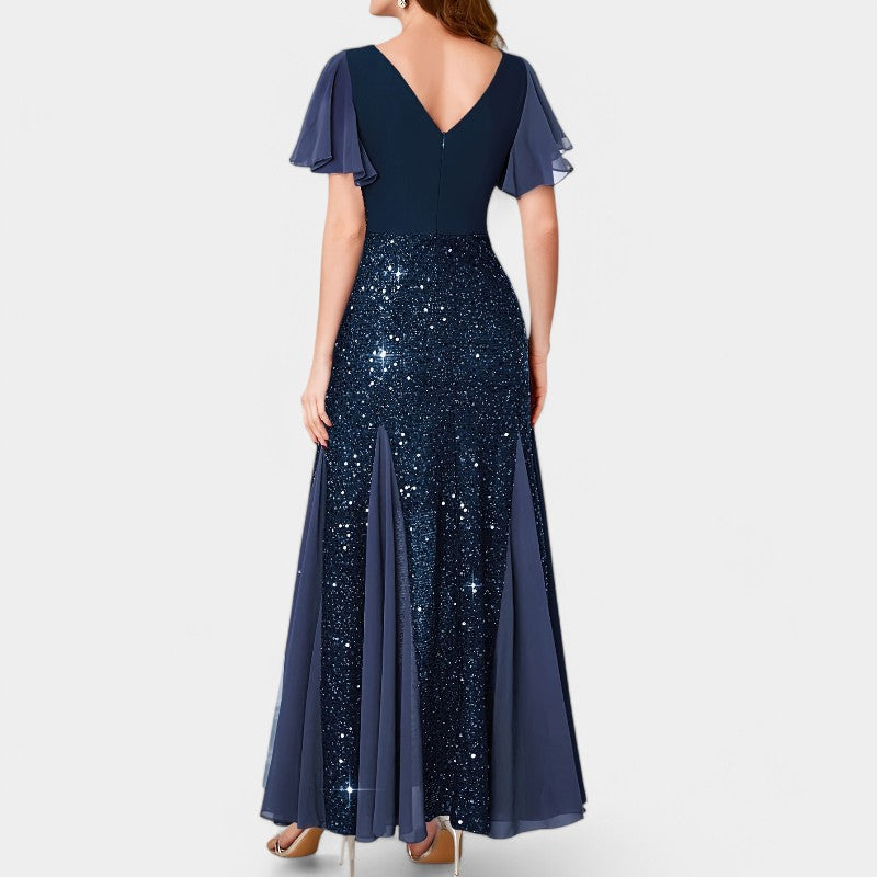 Glitrende kvinne maxikjole med hjerteutskjæring i polyester. En sofistikert festkjole, perfekt for dans.