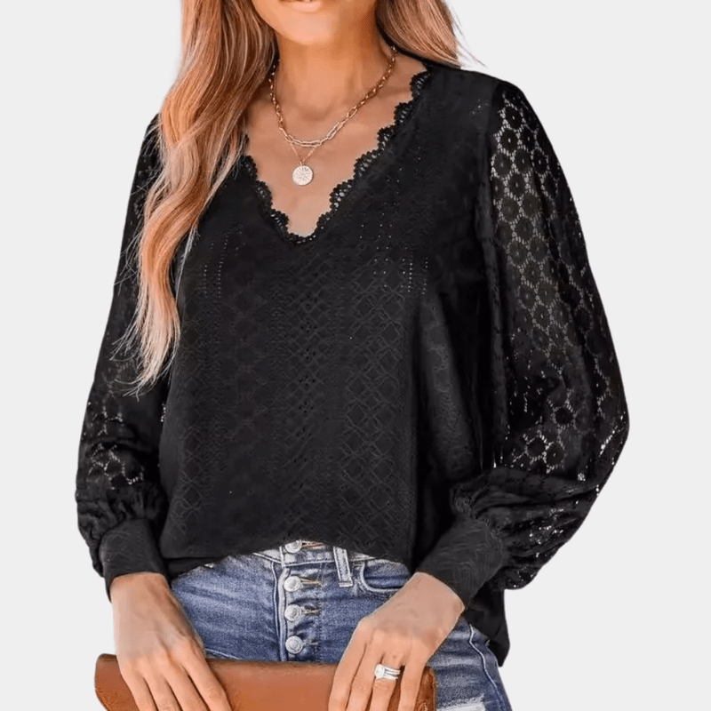 Allsidig kvinne V-hals blondebluse. Ermeløs design, komfortabel og chic for varme dager.