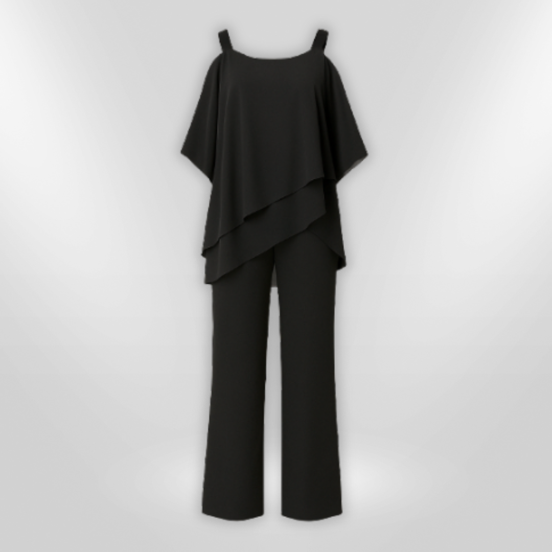 Stilig kvinnesett med unik asymmetrisk genser og elegante, vide bukser.