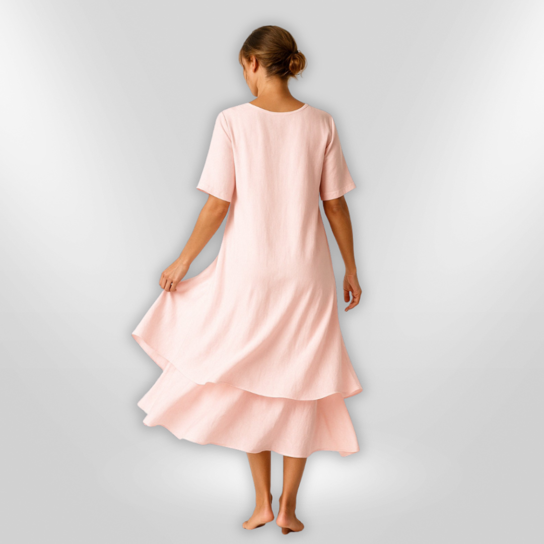 Elegant festkjole i lett bomull for kvinner, ideell for sommerfester og spesielle anledninger.