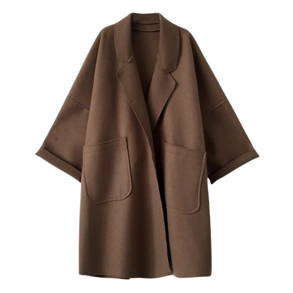 Elegant kvinners lang trenchcoat i vintage stil. Tidløs mote og perfekt yttertøy for høst og vinter.