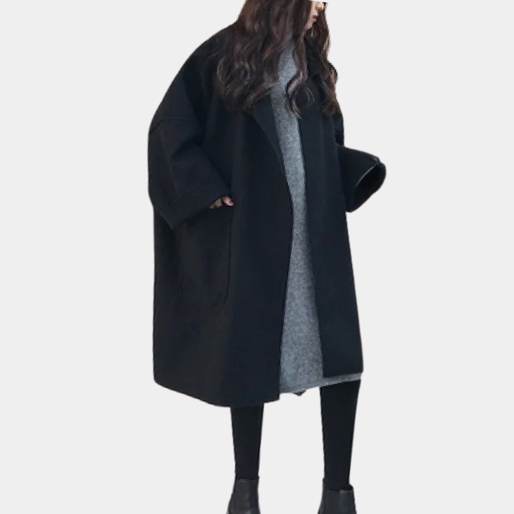 Kvinners lang trenchcoat med vintage appell. En allsidig og elegant frakk for kjøligere dager.