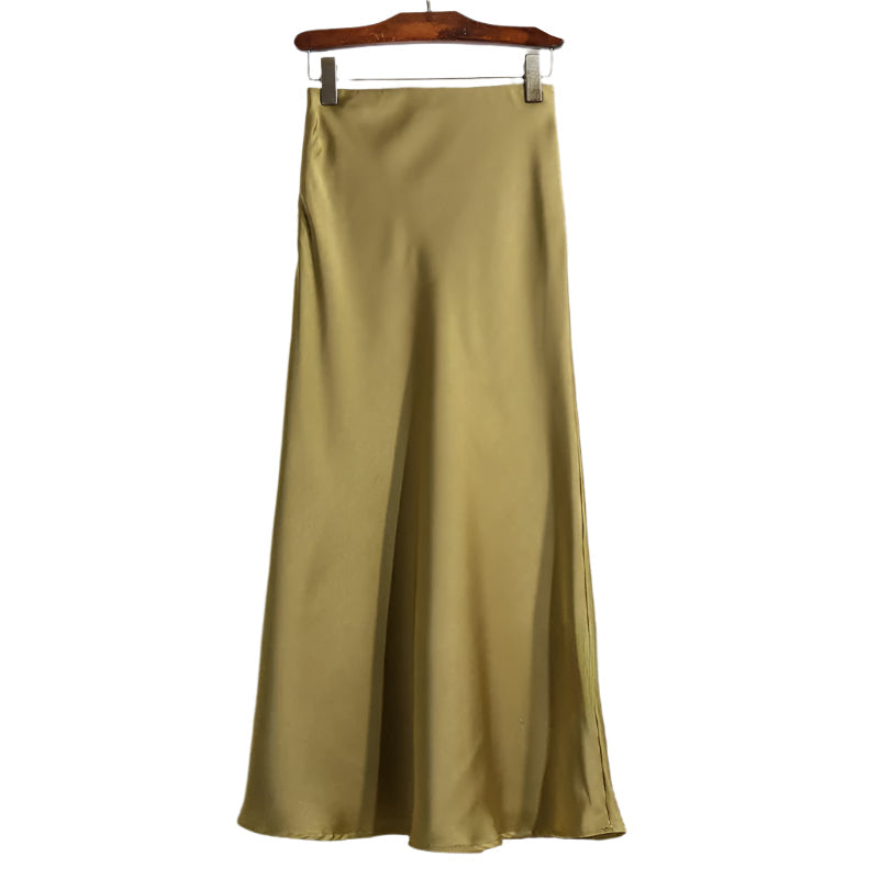 Trendy fiskehaleskjørt for kvinner, middels lengde. Elegant, stilrent og et must for kvinnemote.