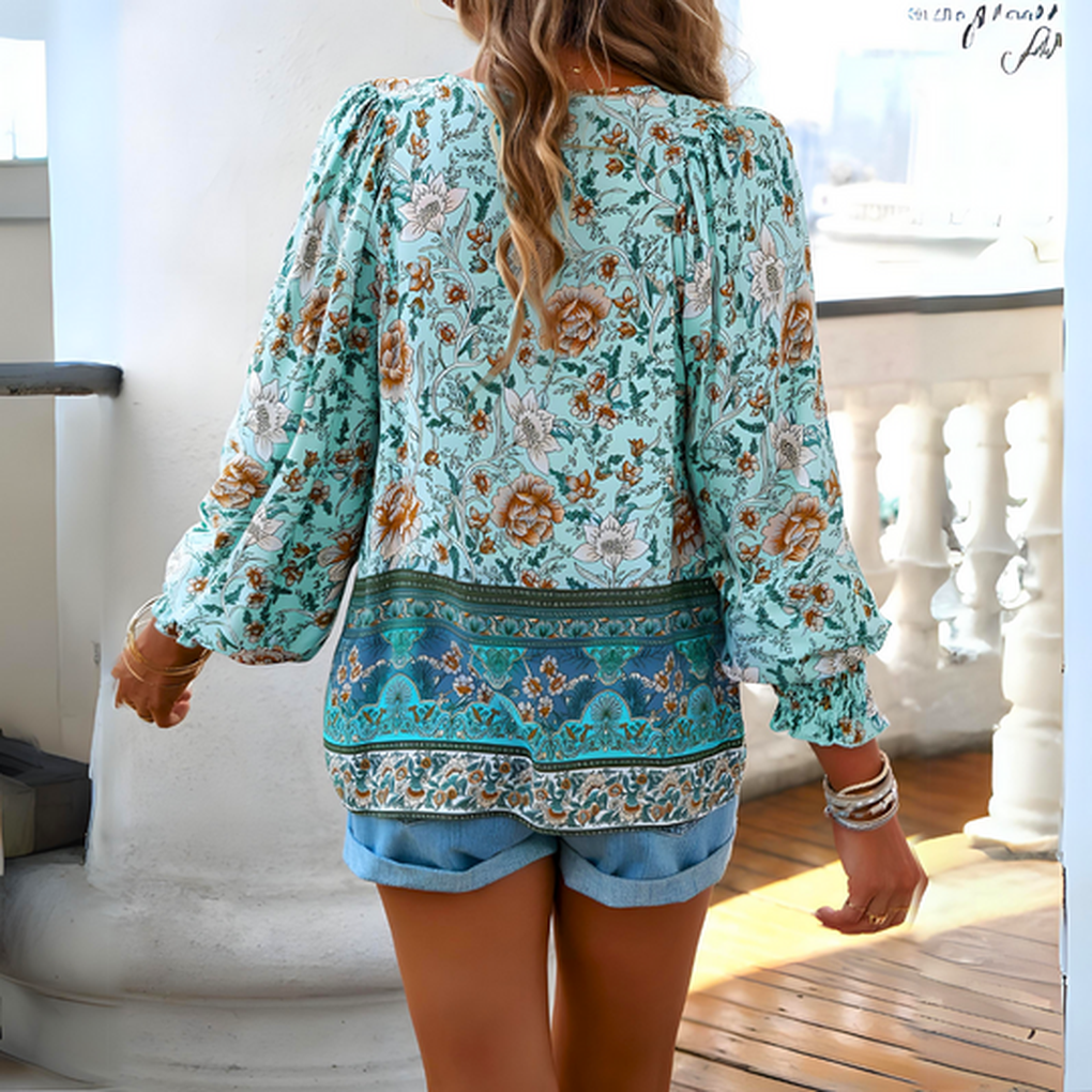 Stilig langermet blomsterbluse for kvinner, en allsidig og casual topp med vakkert design.