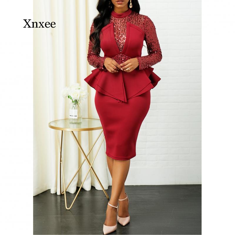 Kvinner midi paljettkjole i bodycon-stil, et elegant og glitrende festantrekk med lange ermer.