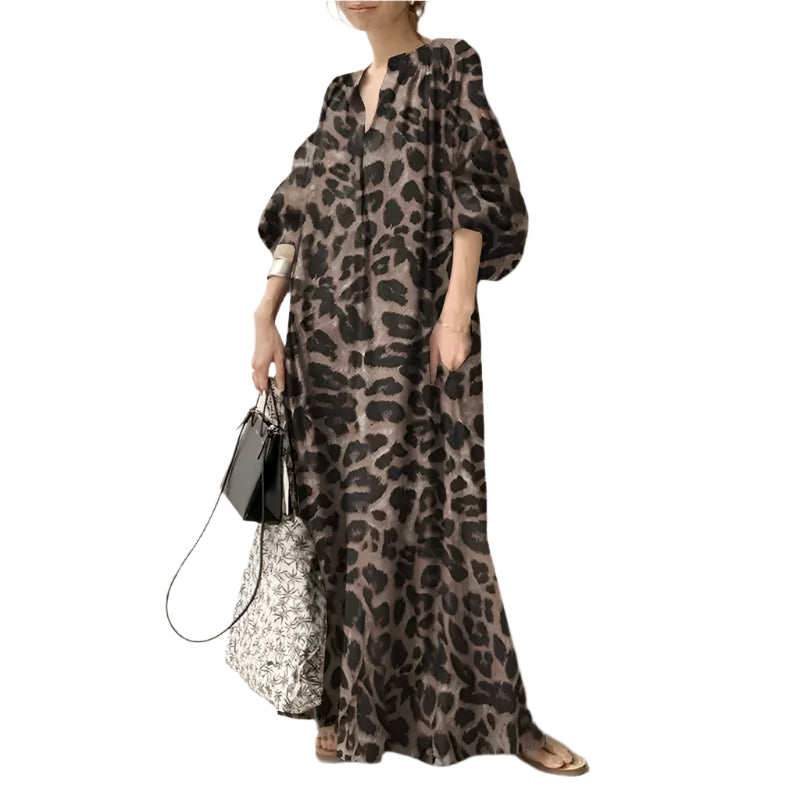 Komfortabel leopard maxikjole til kvinner med puffermer, ideell som festkjole eller elegant hverdagsantrekk.