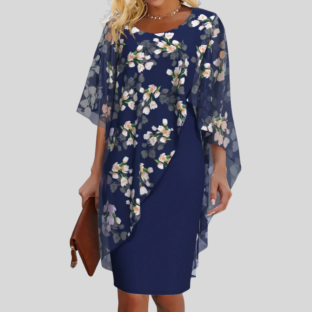 Elegant mørkeblå blomstret chiffonkjole med A-linje for dame. Perfekt sommerkjole eller festkjole.