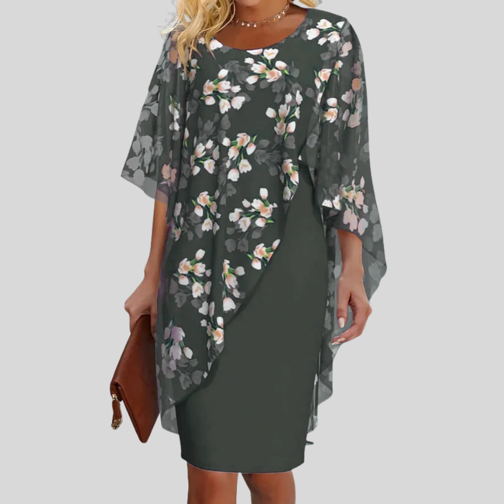 Grasiøs armygrønn blomstret chiffonkjole. Elegant A-linje og lettvekt stoff for sommer og fest.