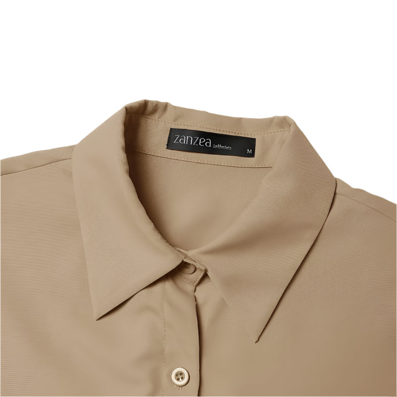 Kvinners elegante midi-kjole med høy midje og korte ermer. Komfortabel og allsidig skjortekjole.
