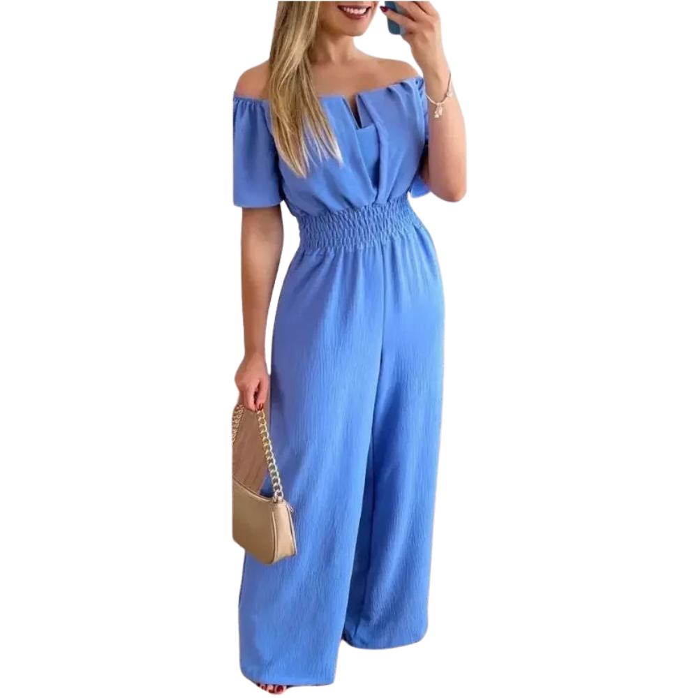 Ryggdetaljer av elegant off-shoulder jumpsuit. Perfekt for sommer og festlige anledninger.