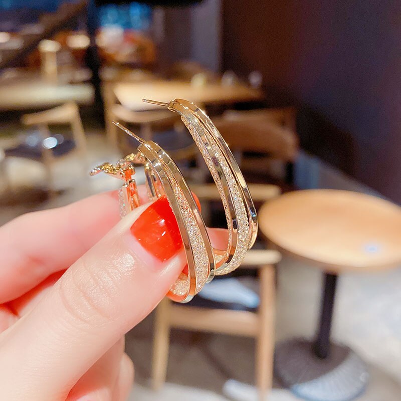 Elegante sølvfargede ovale bøyleøreringer med glitrende zirconia, kvinnesmykker gaveidé.