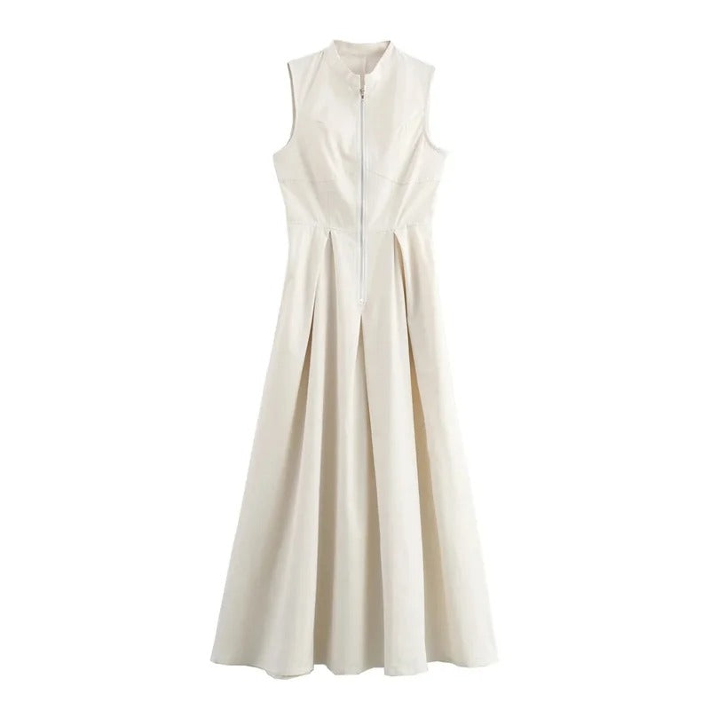 Elegant plissert midikjole for dame i tidløs stil. Perfekt som festkjole eller hverdagskjole, med glidelås.
