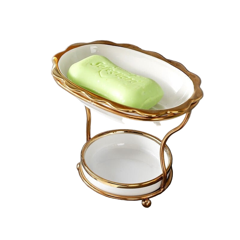 Elegant såpeskål i keramikk med effektiv drenering. Perfekt for badet og holder såpen tørr.