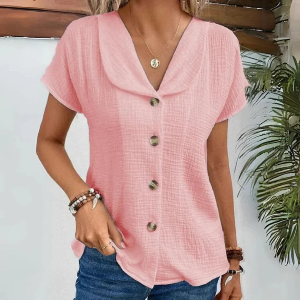 Komfortabel damesommerbluse med allsidig design. Elegant stil med puffermer, ideell for en feminin sommerlook.