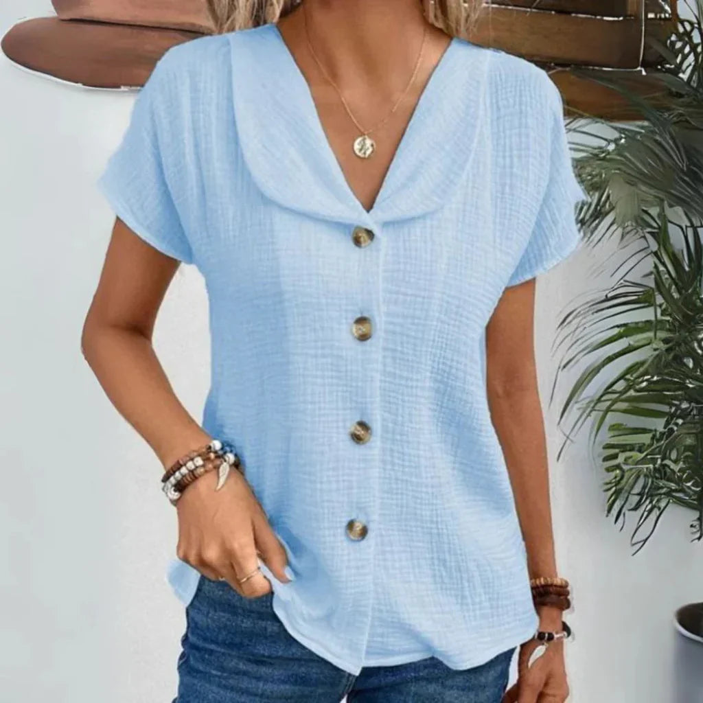 Lett og luftig elegant sommerbluse. Feminin passform med V-hals og puffermer for komfortabel vårmote for kvinner.