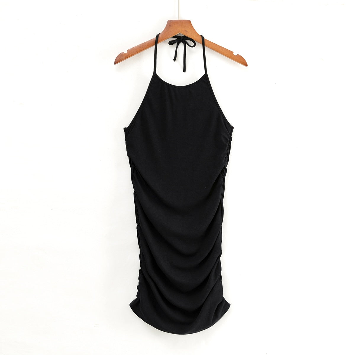 Elegant svart bodycon festkjole med spaghettistropper for kvinner. Stilren minikjole til kveldsantrekk.