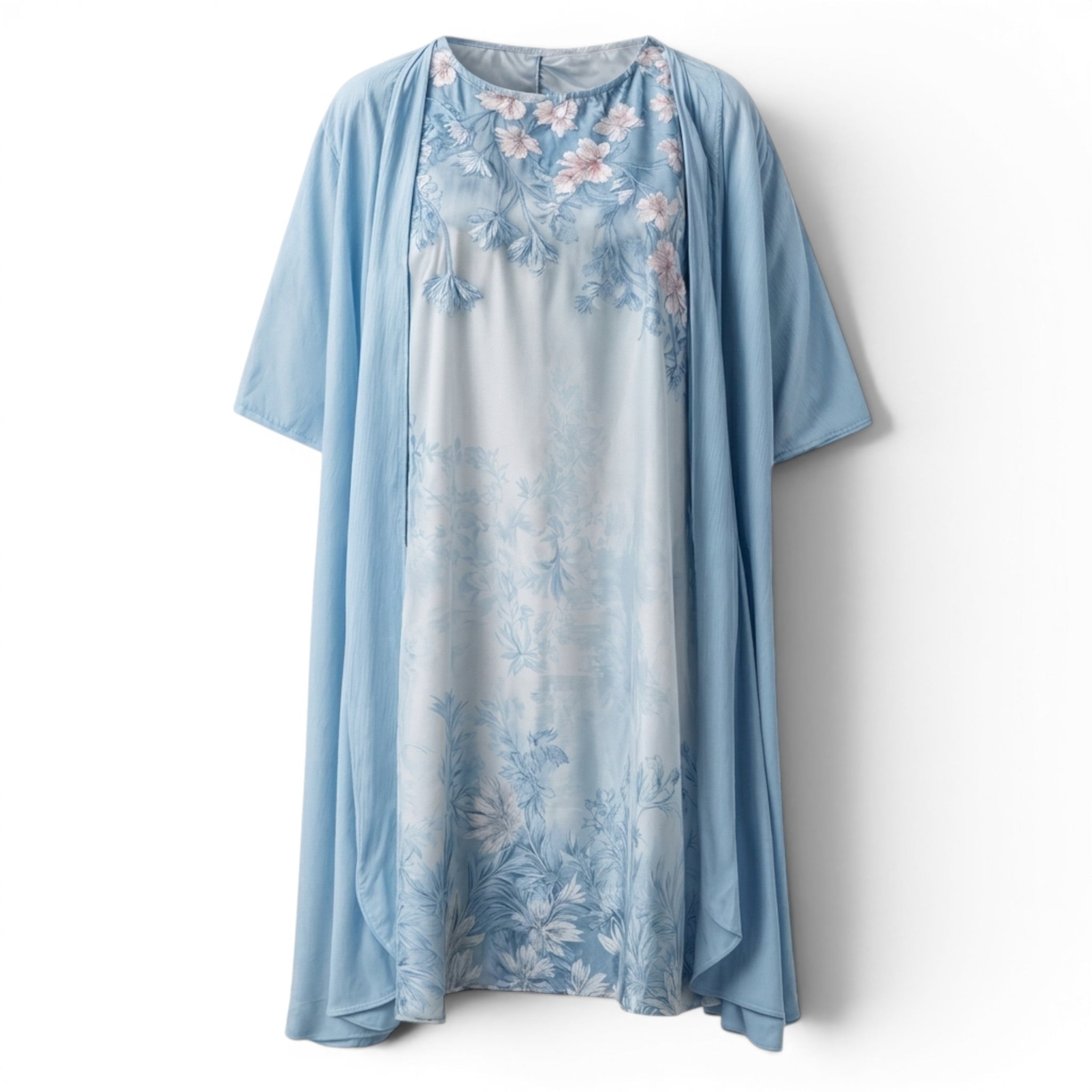 Elegant knelang vårkjole med detaljert blomsterprint, feminin, komfortabel og ermeløs.
