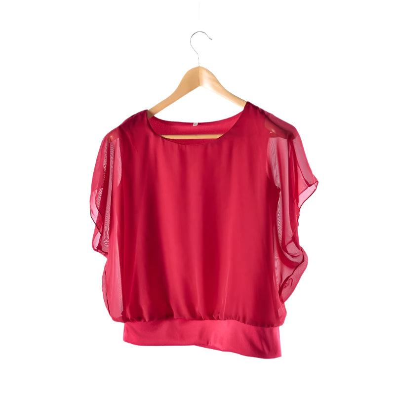 Elegant kontorbluse for damer med volang, løs passform og rund hals. Komfortabel hele dagen.