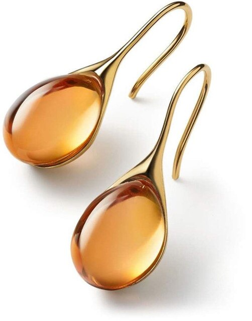 Lange dråpeøreringer med glitrende krystaller. Iøynefallende dametilbehør som gir en sofistikert 'bling' effekt.