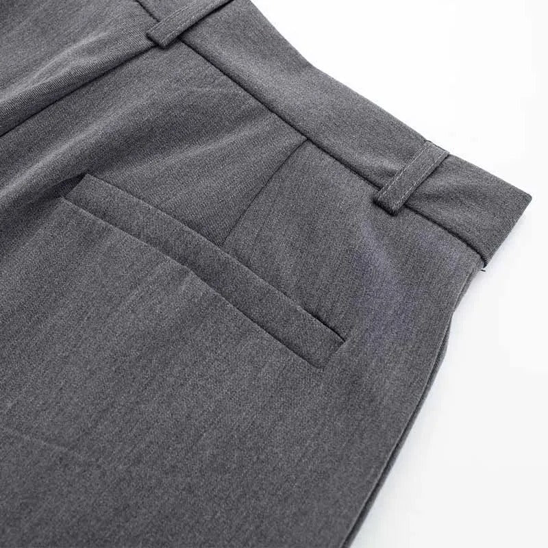 Moderne damebukser med vide ben og høy midje i grå, ideelle for en stilig og komfortabel hverdagslook.