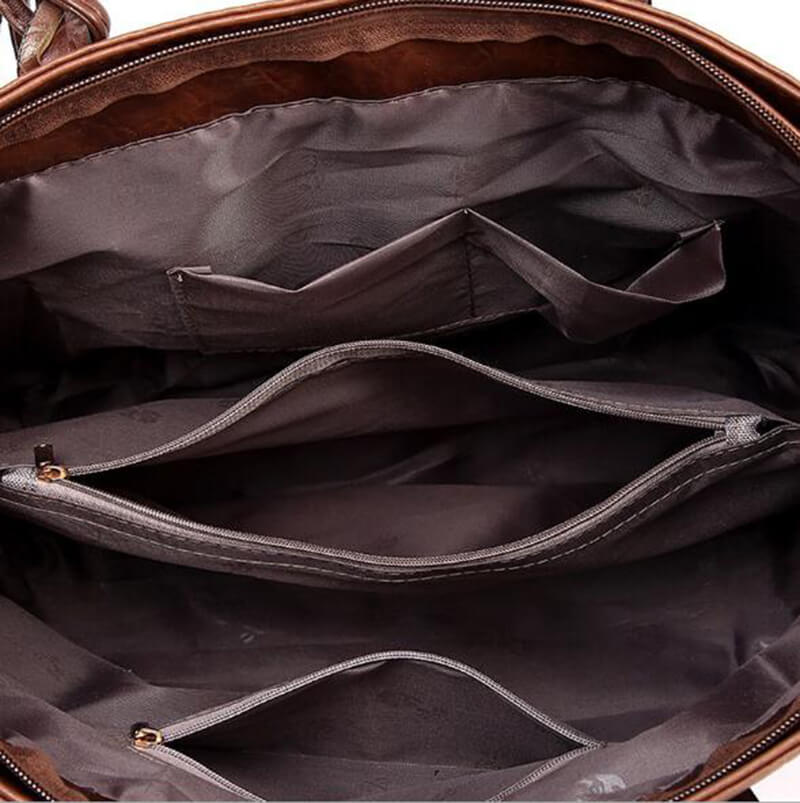 Elegant dame skulderveske for hverdagsbruk, i kunstlær med flettede bærehåndtak, i stilig design.