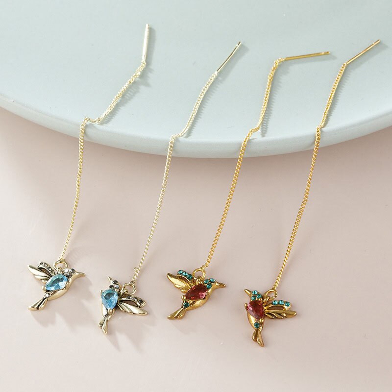Kvinners øredobber, kolibri design med zirkonia og rhinestone. Elegante og fargerike dråpeøreringer.