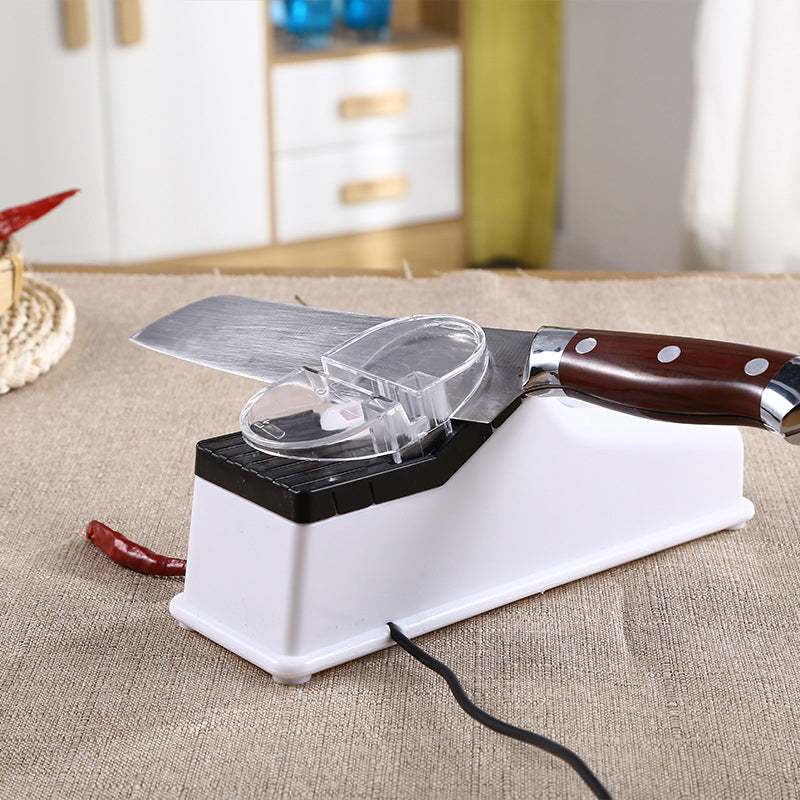 Moderne elektrisk knivsliper med USB-lading. Perfekt for å oppnå sylskarpe kjøkkenkniver på sekunder.