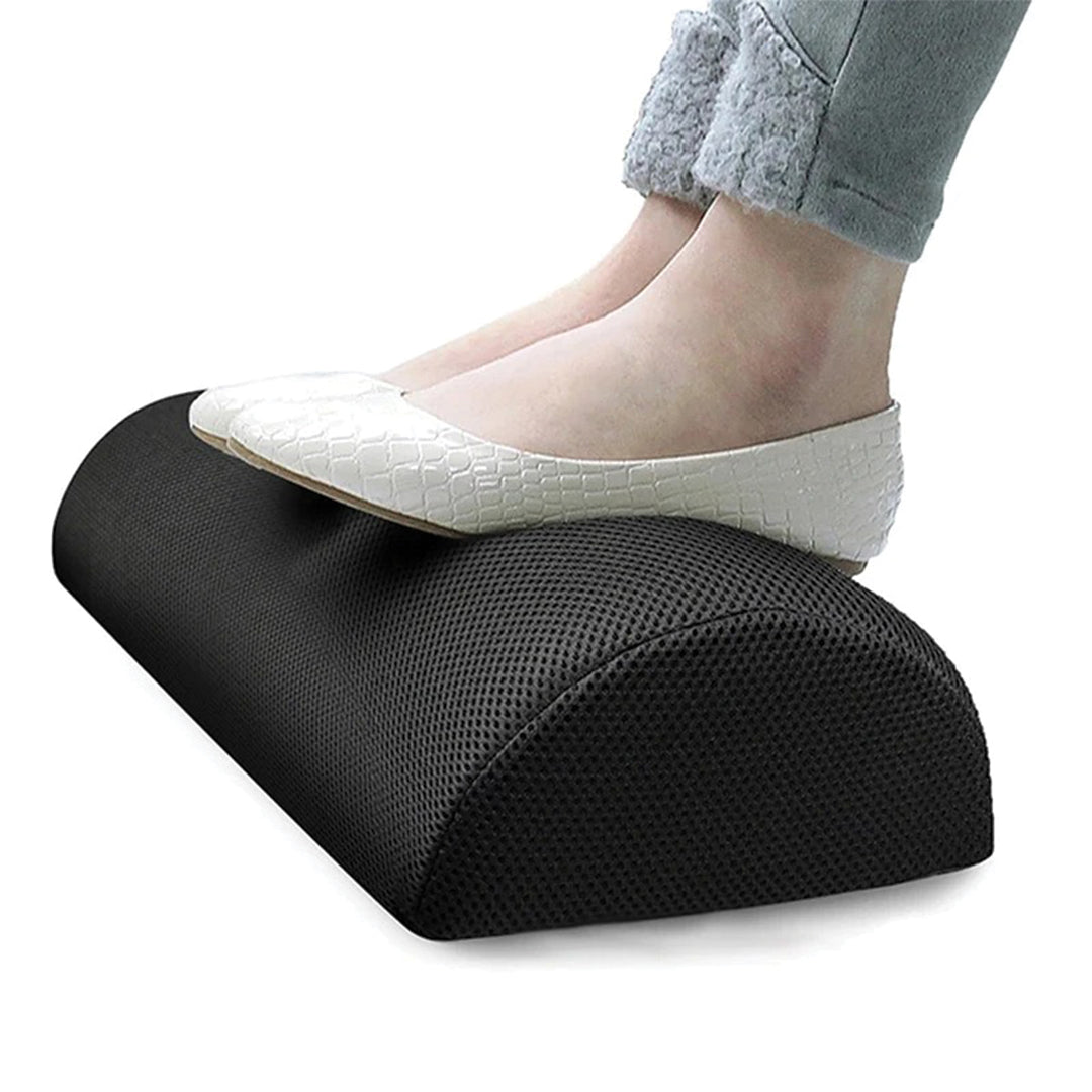 Svart/grå vaskbar fotstøttepute. Designet for optimal sittekomfort og støtte for bena.