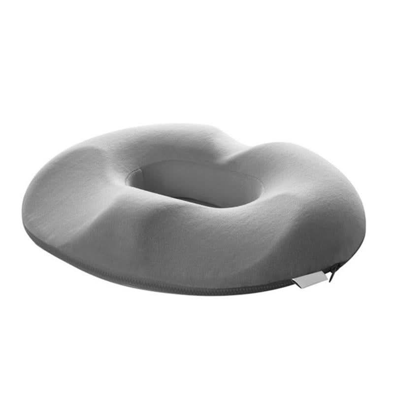 Nærbilde av ergonomisk setepute i høy kvalitet, designet for sittekomfort og avlastning ved arbeid eller reise.