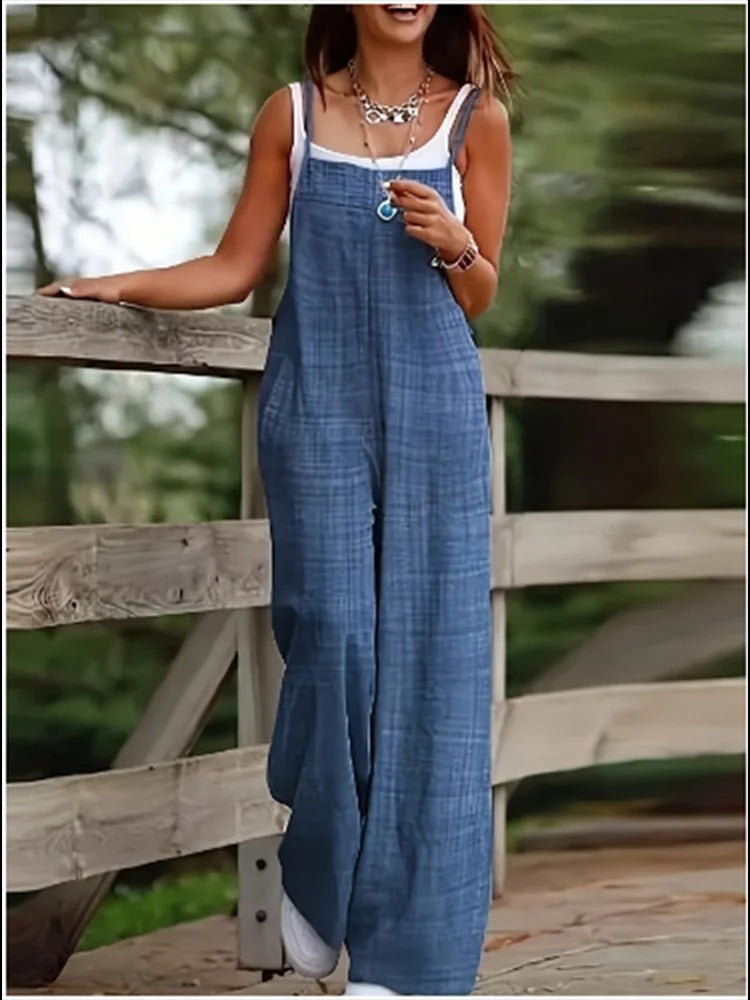 Komfortabel dame jumpsuit med løs passform, ermeløs og vide ben, perfekt for en avslappet look.