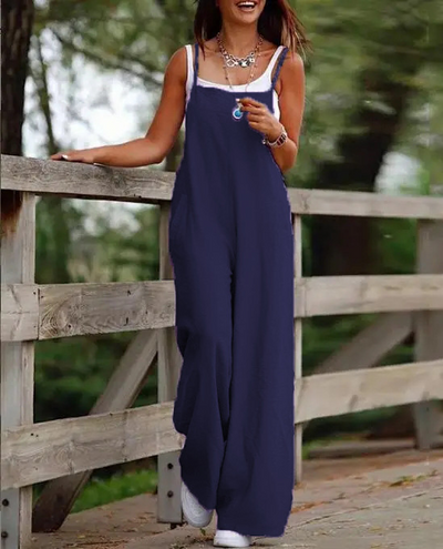 Moderne damejumpsuit, ermeløs med vide ben og løs passform, ideell for en allsidig casual stil.