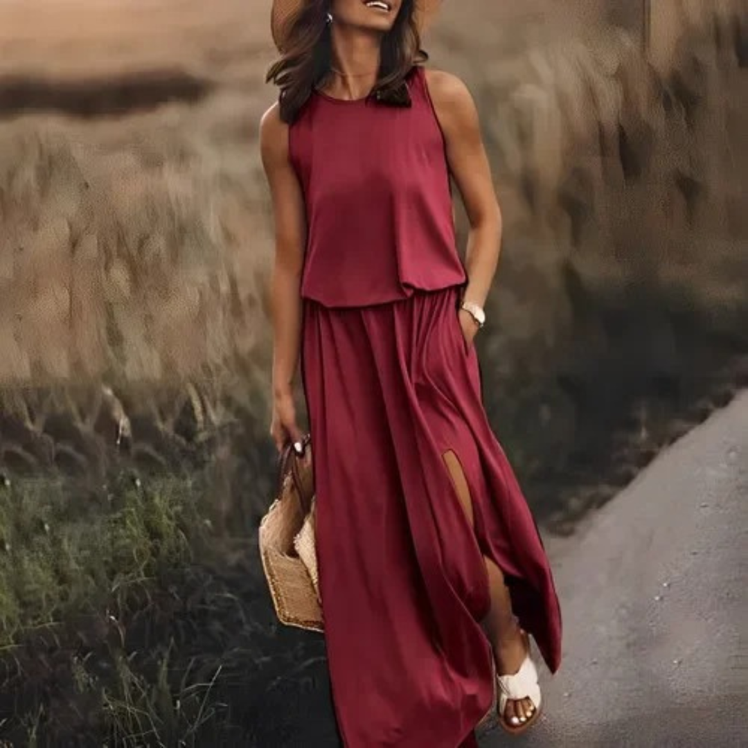 Elegant casual damekjole: Lang ermeløs splittkjole. Perfekt for sommeren og hverdagsbruk.