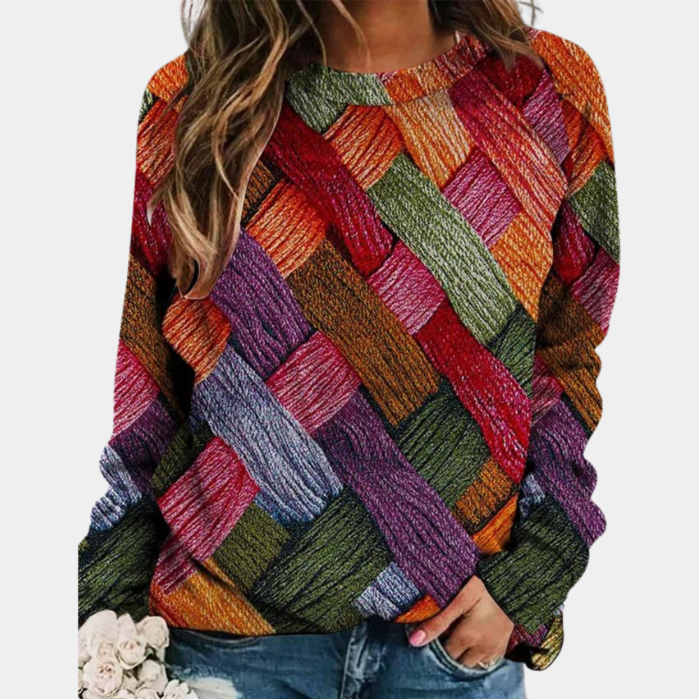 Moteriktig damegenser i fargerik design. Pullover med løs passform, ideell for komfortabel hverdagsbruk.