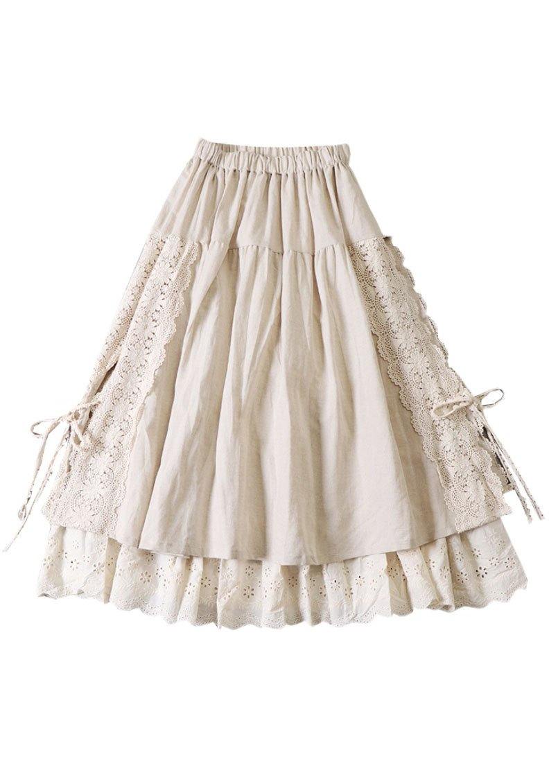 Feminint høstskjørt med rynker og patchwork. Komfortabelt midi dameskjørt i beige og brune toner.