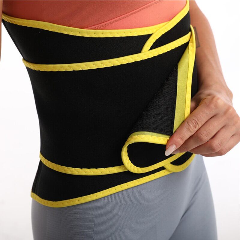 Dame midjetrimmer i gul, svart, rød, kombinert som effektiv shapewear og hofterformer.