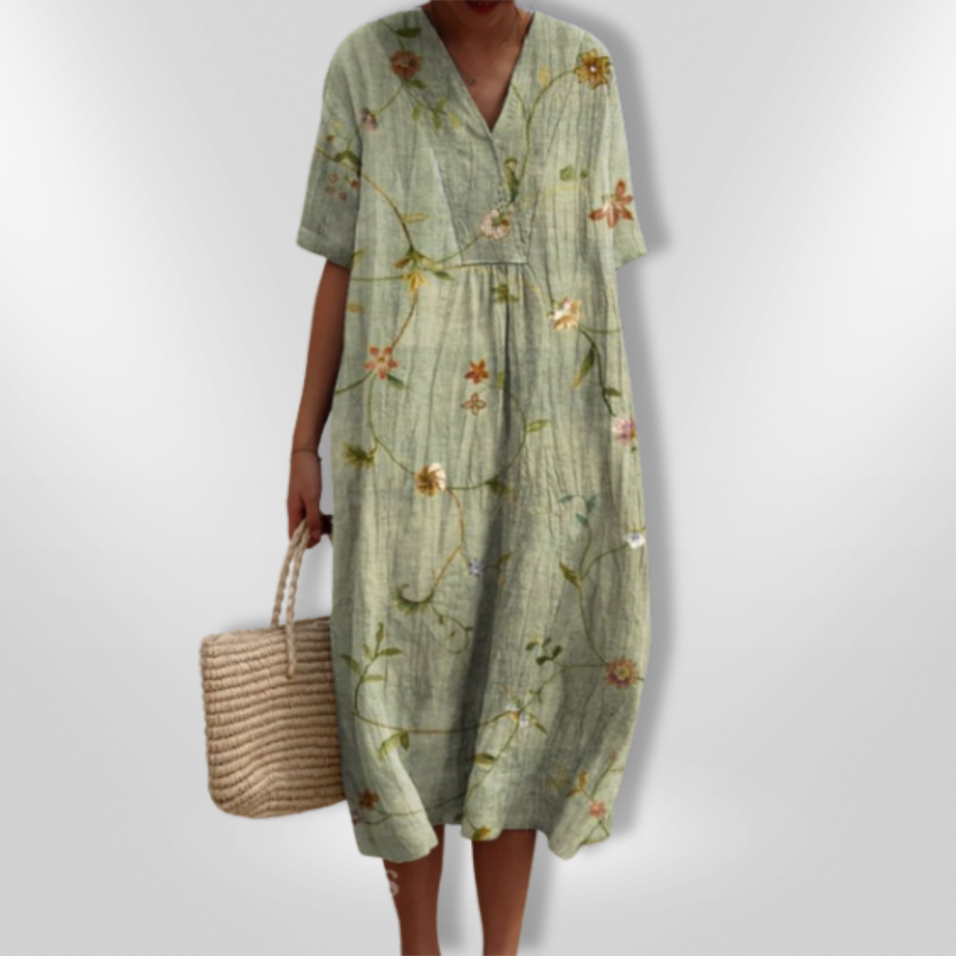 Modisches Damen Sommerkleid mit floralem Design und V-Ausschnitt, leicht für warme Tage.