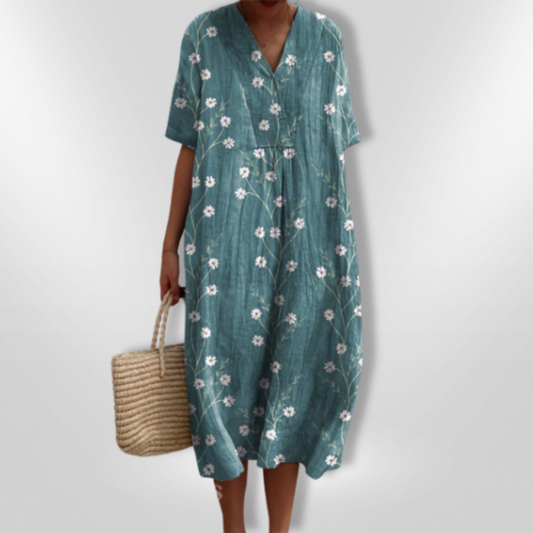 Einzigartiges Damen Sommerkleid mit auffälligem Blumendruck, locker geschnitten, für den Urlaub.