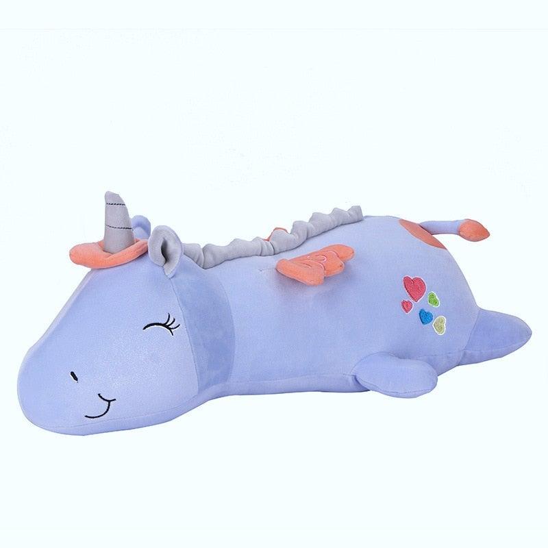 Glødende enhjørning kosedyr i myk plysj. Perfekt nattlampe for et trygt og koselig barnerom.