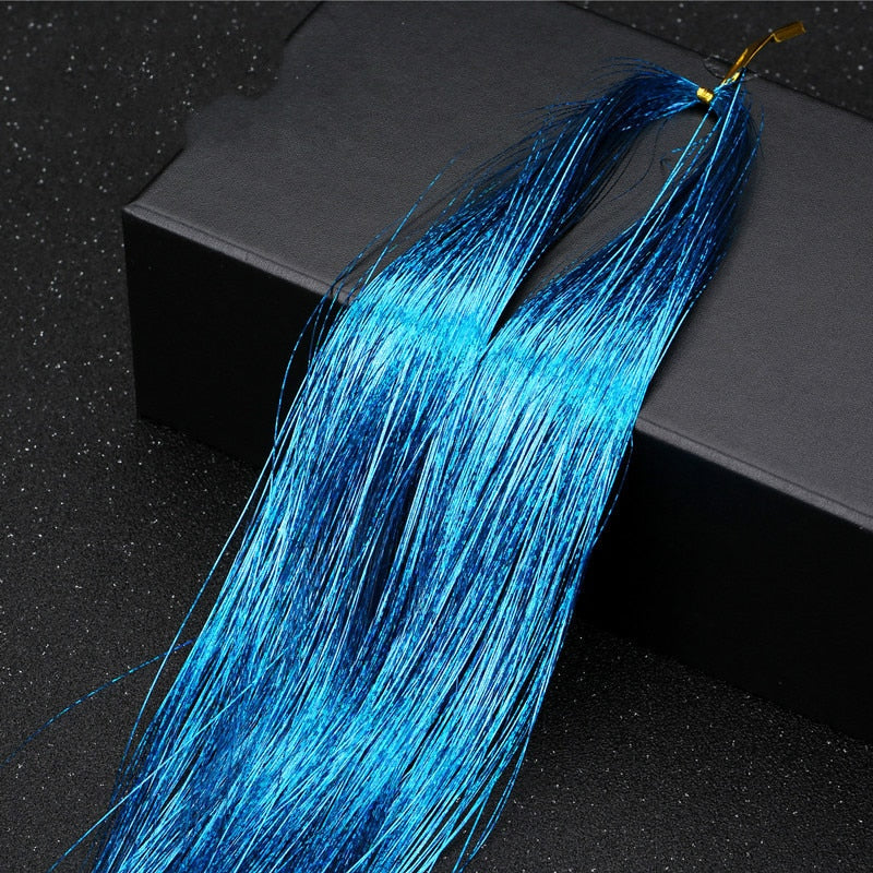 Varmebestandige tinsel extensions, trygge og gjenbrukbare for din unike hårstil.