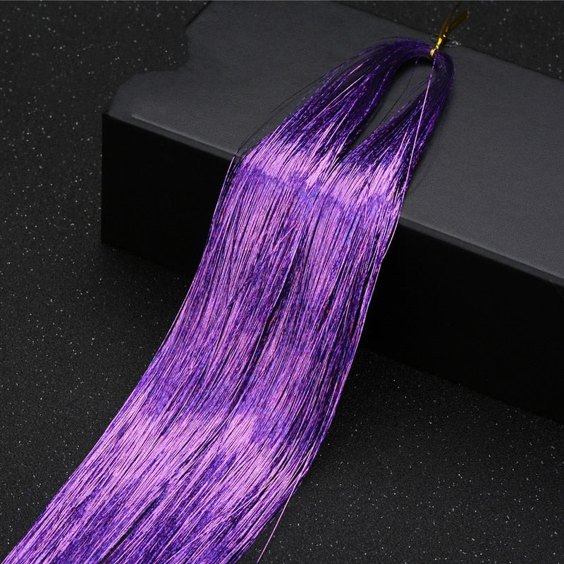Tinsel hårforlengelse for en elegant og fargerik hårstil til enhver anledning.