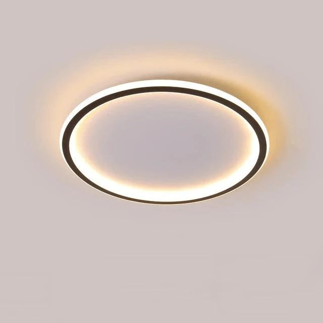 Stilren grå taklampe i minimalistisk design. Energieffektiv LED-belysning ideell for moderne hjemmeinnredning.