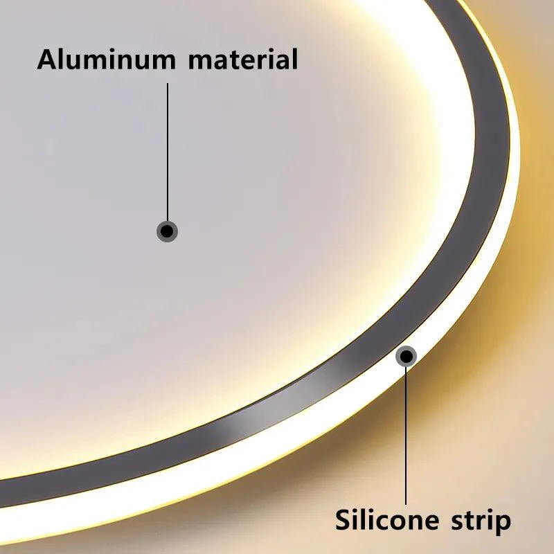 Moderne, energieffektiv grå taklampe. Minimalistisk LED-design for innendørsbelysning og stilren hjemmeinnredning.