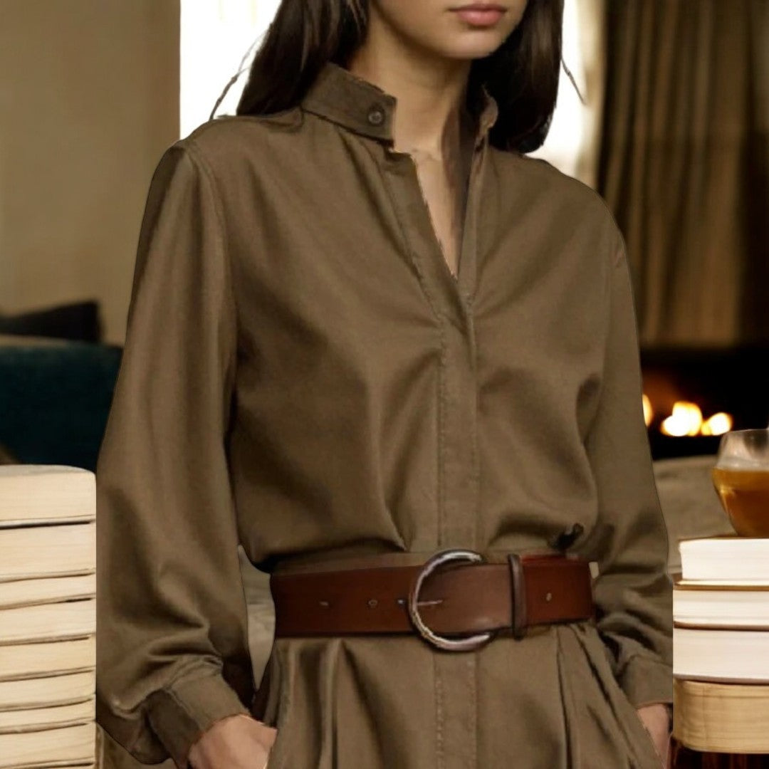 Trendy grønn bluse for kvinner; puffermer og knapper gir et moderne, elegant uttrykk.