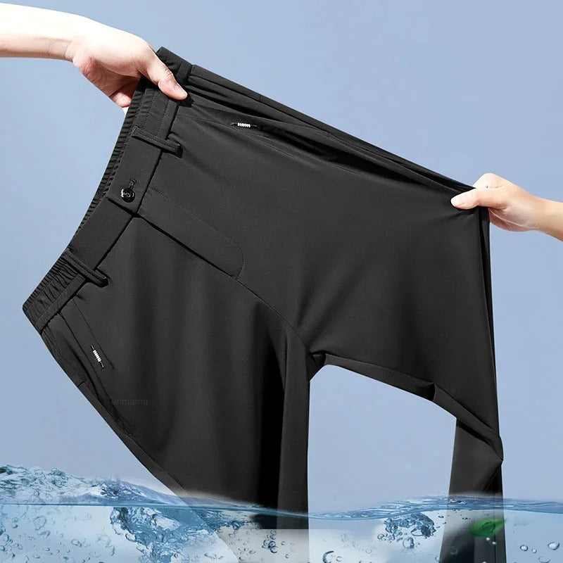 Herrebukser for reise, lettvekt og hurtigtørkende. Grå slimfit stil for komfort.