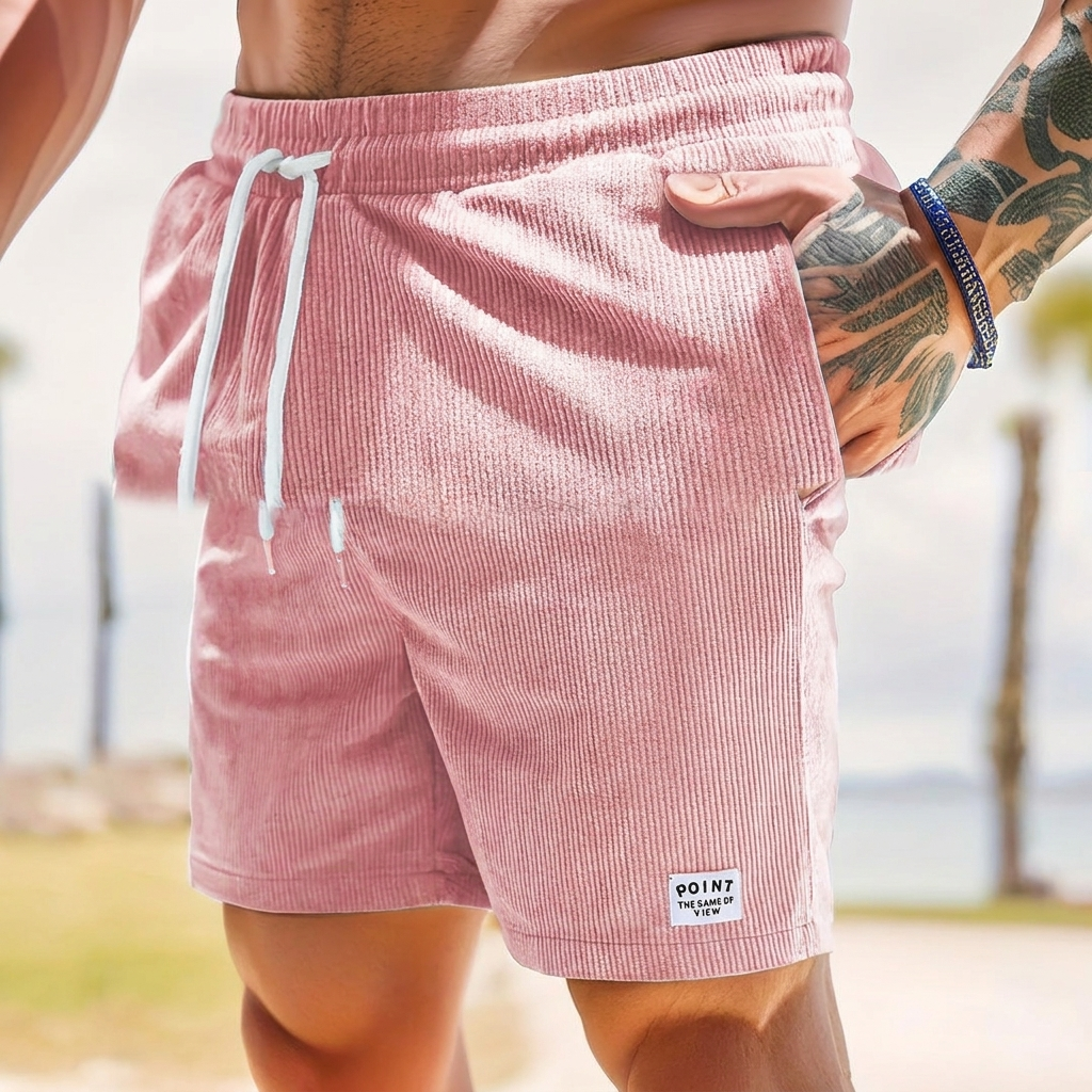 Svarte avslappede shorts for herrer med snøring og en knelang passform. Essensielle for sommeren.