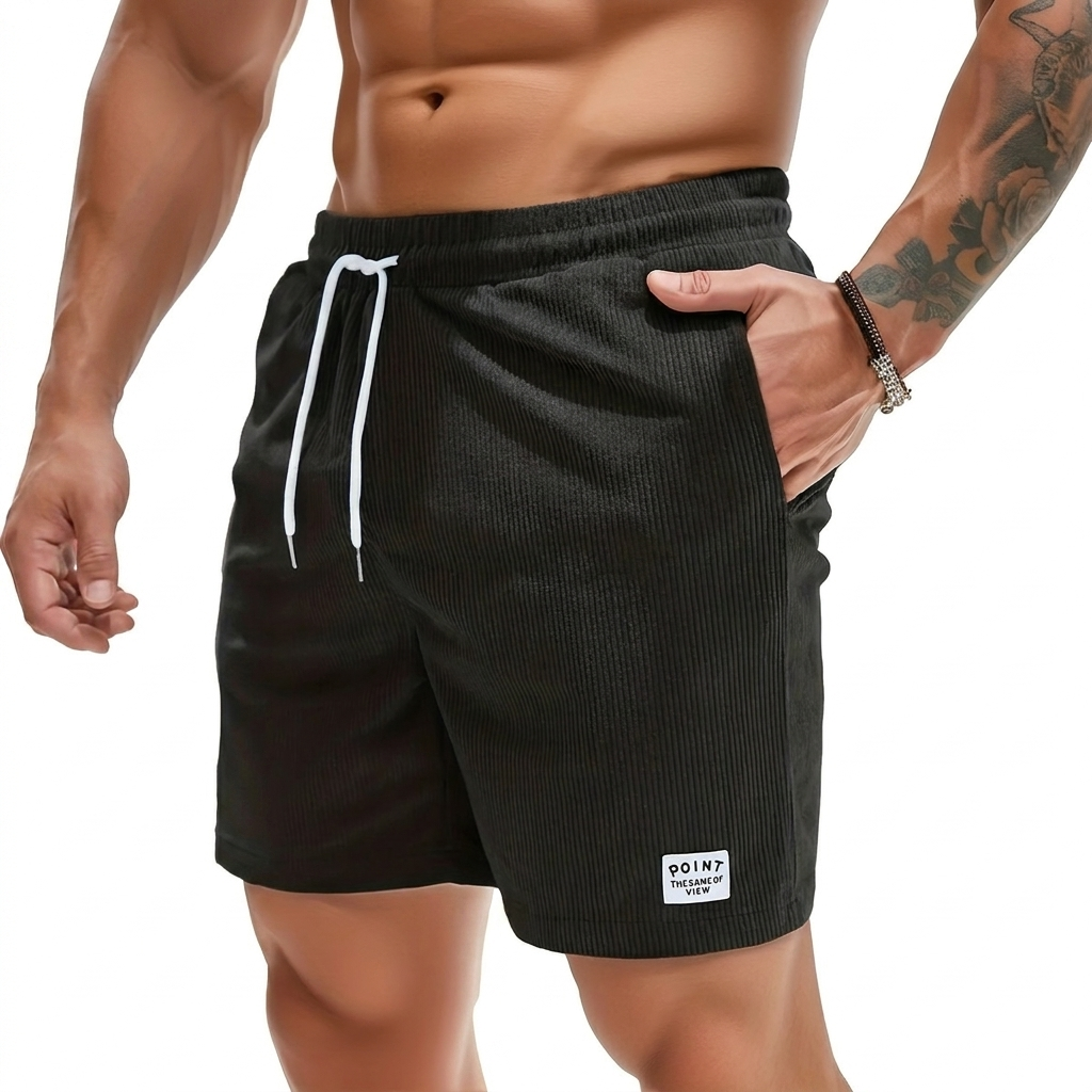 Grønne knelange herre shorts med snøring. Komfortabel fritidsshorts for avslappede dager.